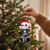 Jack Skellington Santa Hat 2026 Christmas Ornament - front view hanging on a decorated Christmas tree