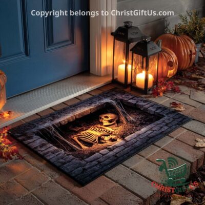 Skeleton Tomb Halloween 2026 Doormat - angled front view showing skeleton grave design