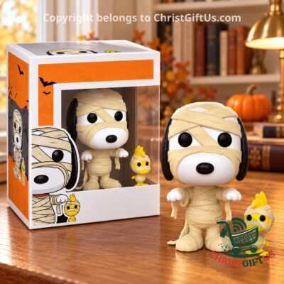 Mummy Snoopy and Woodstock figures beside their Halloween box